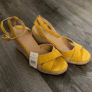 Beautiful never worn yellow espadrilles.